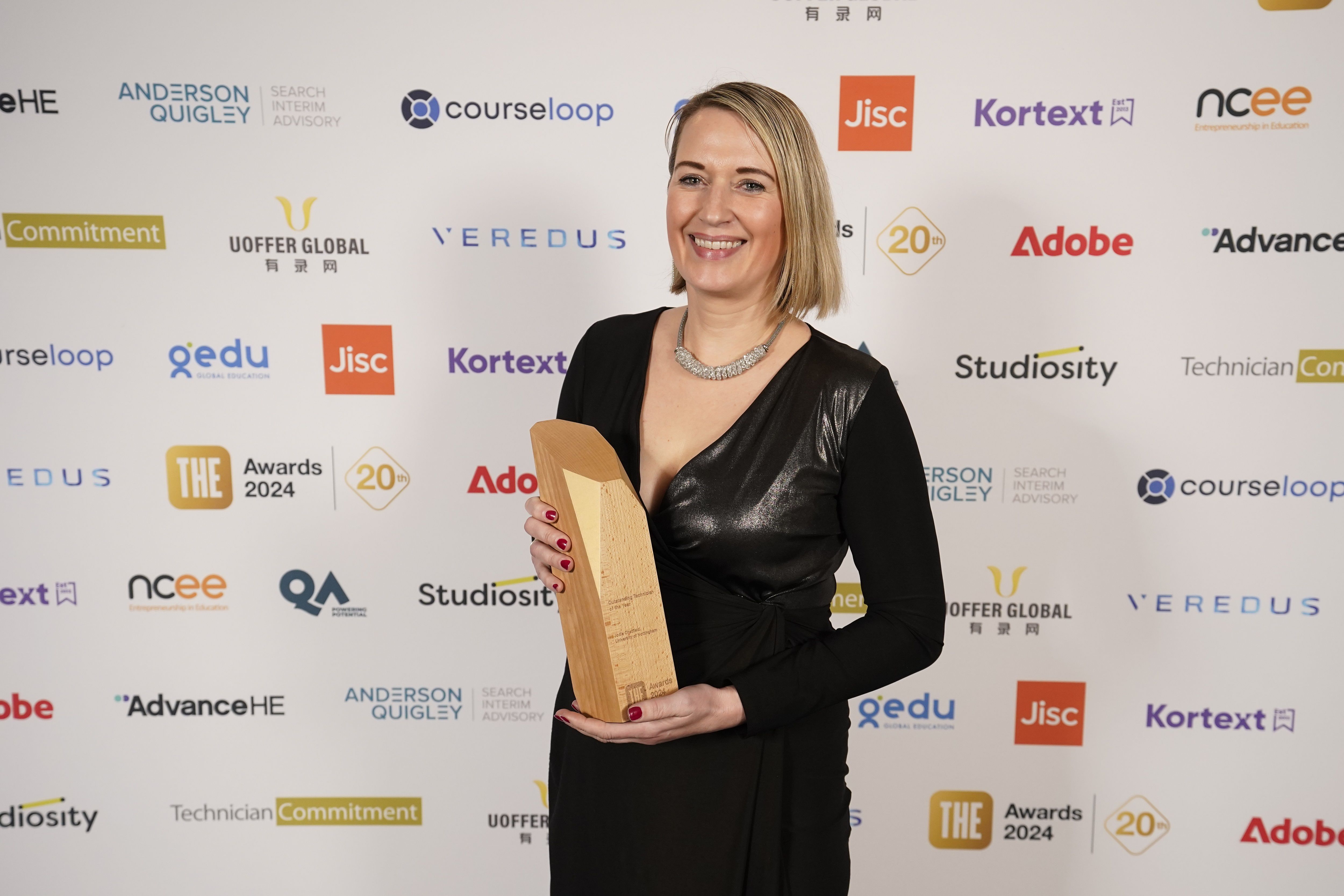 Jodie holds her awards