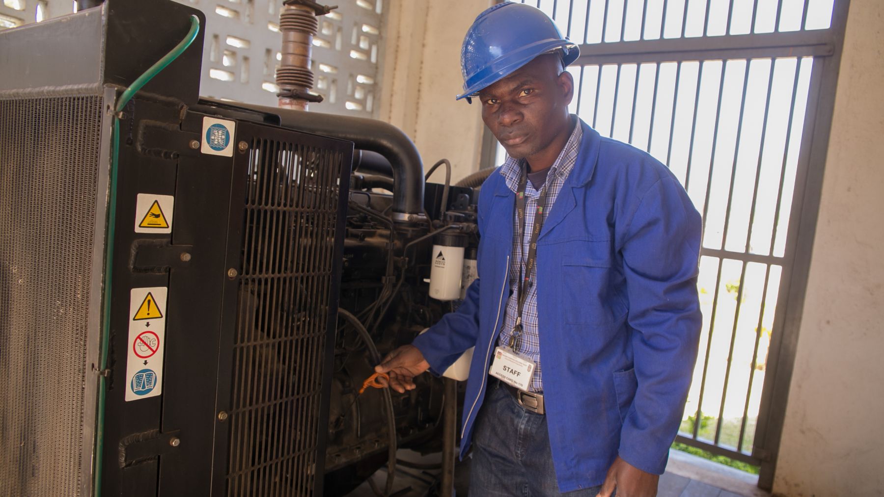 Wellcome Trust staff working with the equipment