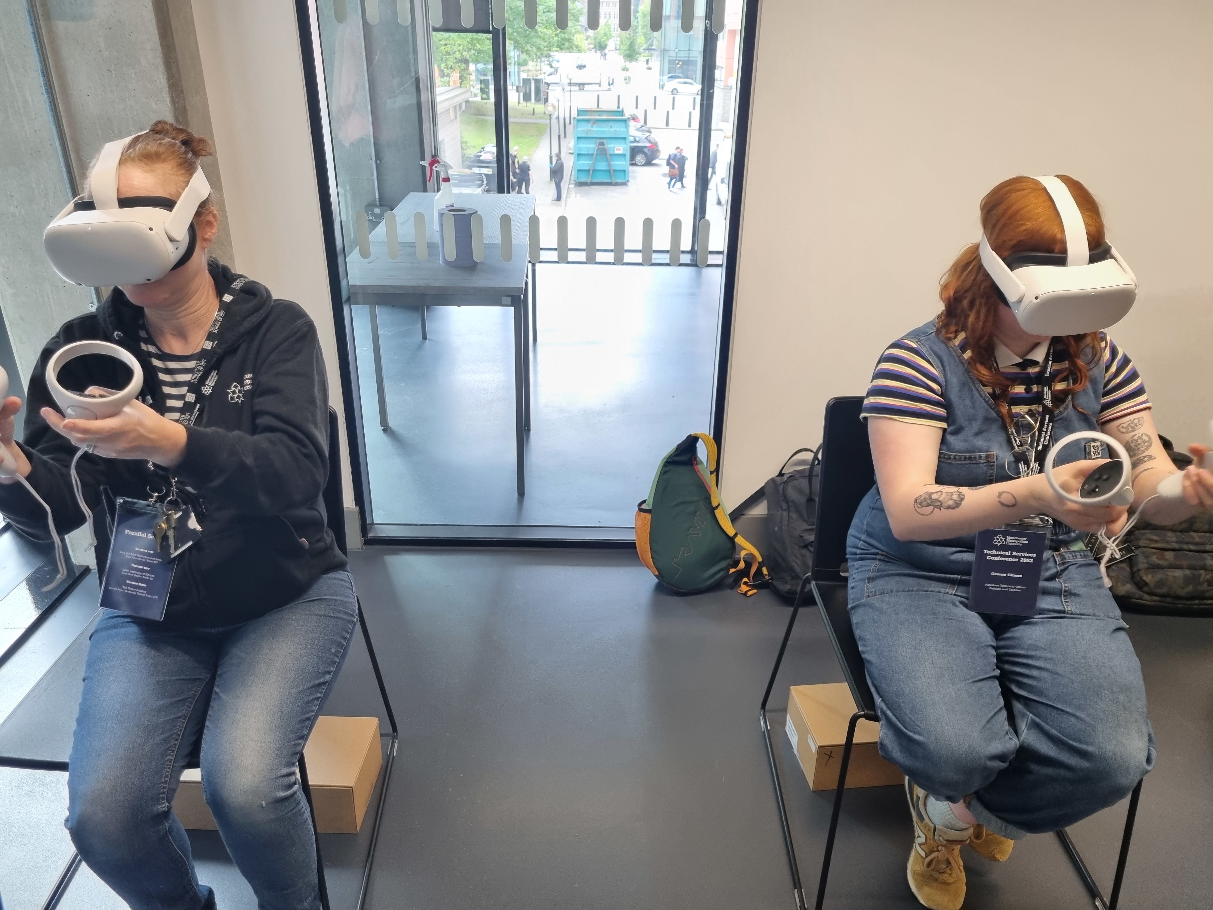 Vicki and George testing VR headsets at the Manchester School of Art, Manchester Metropolitan University