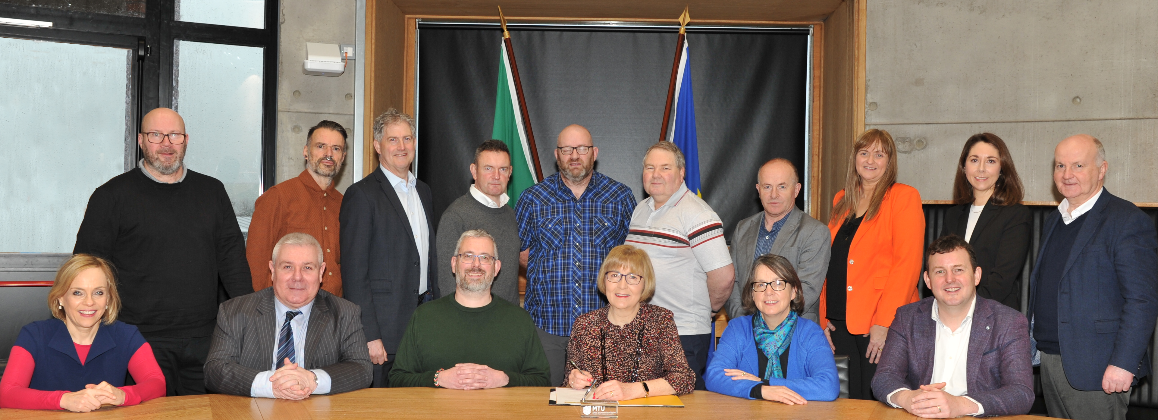 MTU colleagues sat at a table during the Technician Commitment signing