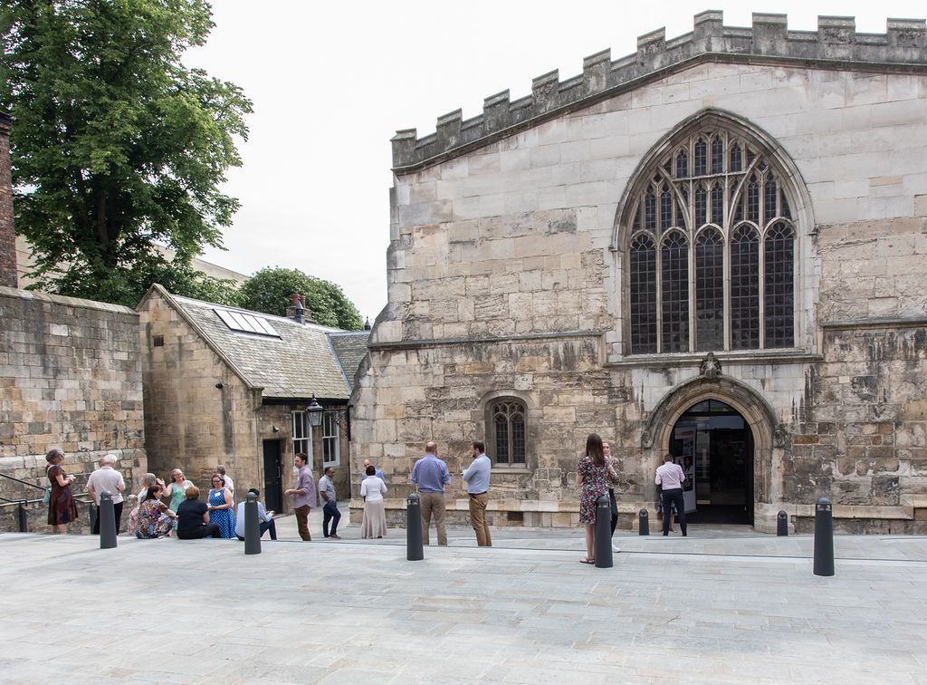attendees standing outside York Guildhall